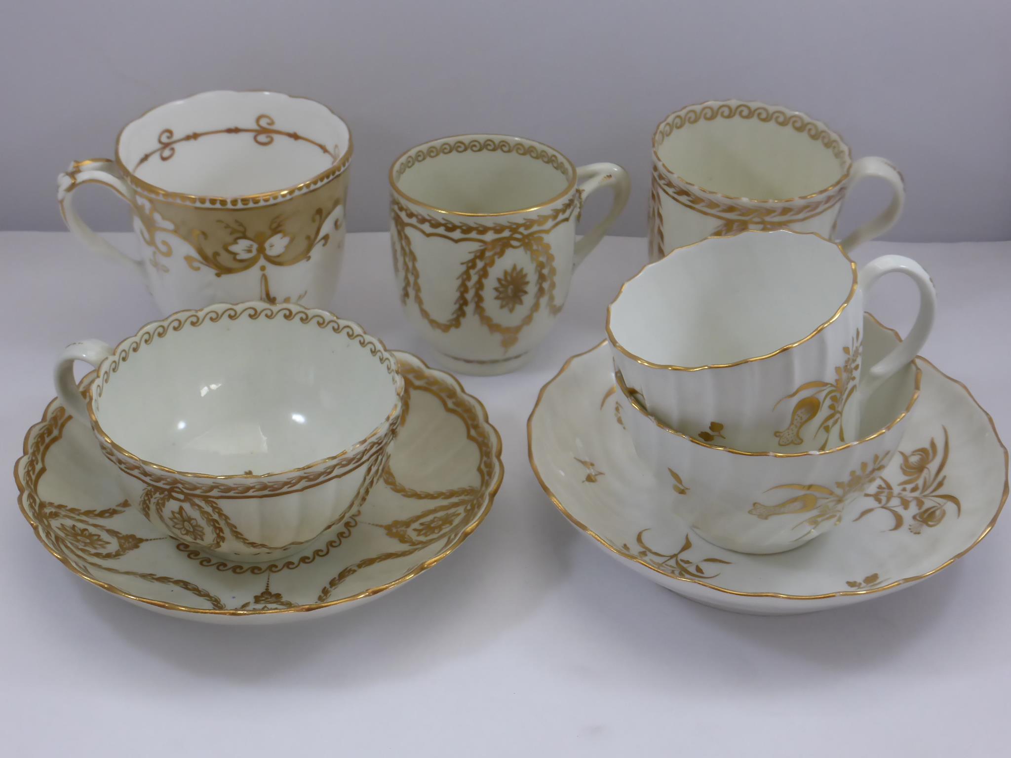 18TH CENTURY WORCESTER AND OTHER GILT AND WHITE WARE INC. COFFEE CUP MARKED FLIGHT WITH MATCHING