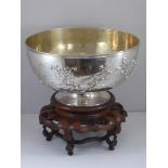 CHINESE EXPORT WHITE METAL PEDESTAL BOWL WITH RELIEF FLOWERING BRANCH DECORATION, APPROX. 22.5cm