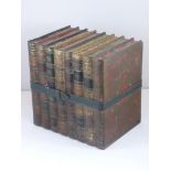 NOVELTY HUNTLEY AND PALMER BISCUIT TIN IN THE FORM OF 8 BOUND BOOKS