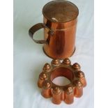 19TH CENTURY COPPER RING JELLY MOULD APPROX. 15cm DIA. AND A SIFTER APPROX. 18 cm H.