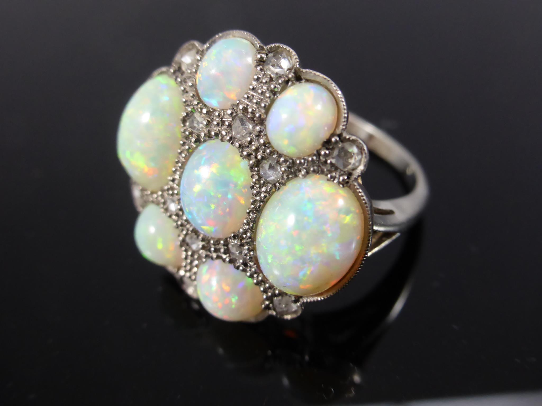 AN IMPRESSIVE DECO STYLE OPAL AND ROSE DIAMOND 18CT ROUND CLUSTER RING