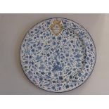 19TH CENTURY DELFT TYPE PLATE WITH ARMORIAL MOTIF INCORPORATING COMPASSES AND CROWN, POSSIBLY