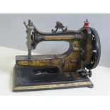 A WARD'S 'ARM AND PLATFORM' SEWING MACHINE IN ORIGINAL WOODEN BOX, APPROX. 33cm WIDE