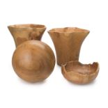 Four carved wooden objects