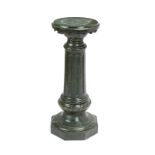 A green marble pedestal