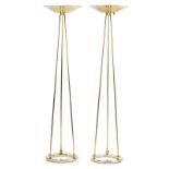 A pair of Casella ''Olympiad'' polished brass torchieres