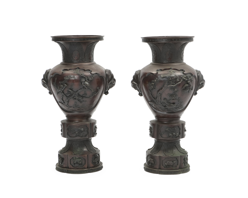 A pair of large Japanese bronze urns
