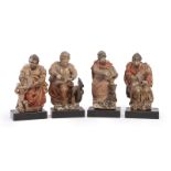 A group of carved santos, the Four Evangelists