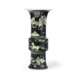 A Kangxi-style famille noir Gu-form porcelain vase