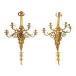 A pair of French-style wall sconces