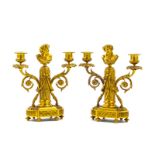 A pair of French gilt-bronze two-light candelabra