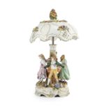 A German porcelain figural table lamp