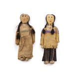 A pair of Plains Indian beaded hide dolls