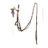 A Crow beaded faceplate/keyhole brow ornament and Sioux bridle