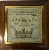 Framed needlepoint sampler baring the inscription '.......