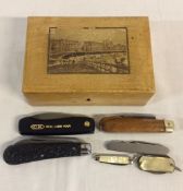 Small Edwardian wooden box & a small collection of penknives