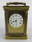 Brass carriage clock signed Charles Frodsham London serial no 59 H 12 cm (excluding handle) (damage