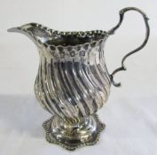 George III silver cream jug (weighted base) London 1771