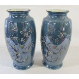 Pair of Carlton ware blue pearl lustre prunus pattern vases with blossom,