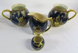 4 pieces of gilt and blue Carlton ware inc 3878 Devils Copse Jug & Fantasia jug (one jug has chips