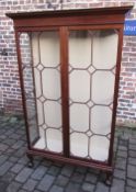 Early 20th century display cabinet in the Chippendale style on ball and claw feet with 3 shelves H