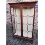 Early 20th century display cabinet in the Chippendale style on ball and claw feet with 3 shelves H