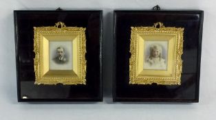 Pair of cased hand tinted photographic miniature portraits of a man & a young girl signed Dinnie