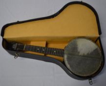 Cased George Formby ukulele/banjolele