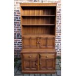 Ercol elm bookcase on cabinet in Golden Dawn finish