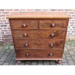 Victorian flame mahogany chest of drawers with turned knobs on ball feet