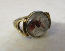 14ct gold reverse intaglio ring of a horse with stirrup and strap design shank (marked 14K) size N