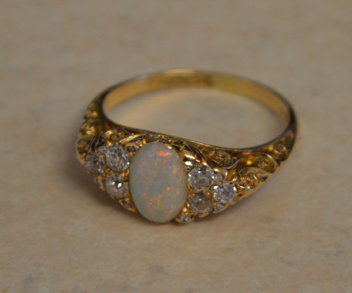 18ct gold opal and diamond cluster ring, opal approx 0.6ct and approx 0.