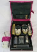 Vanity case fitted with silver topped bottles - Birmingham and London hallmarks together with