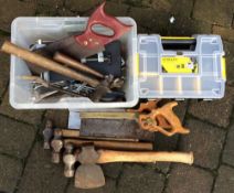Various tools including hammers, saws,