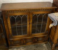 Oak and leaded glass display cabinet