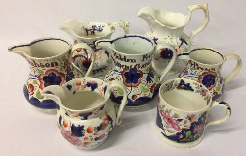 6 Victorian gaudy welsh jugs (3 with names) & a tankard