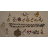 Small silver charm bracelet and approx 15 loose charms, some silver, total approx weight 1.