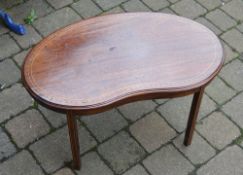 Small kidney shaped table with stringing