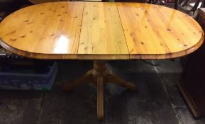 Pine oval draw leaf table with removable leaf L 150cm W92cm (with leaf in)