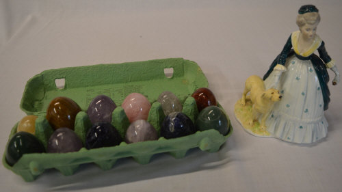 Quantity of polished hardstone eggs and a Coalport figure of a lady