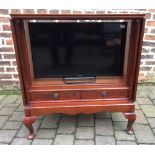 Sony TV with remote and cabinet