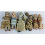 4 miniature early 20th century bisque dolls & 4 miniature plastic baby dolls