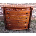 Victorian bow fronted mahogany chest of drawers with turned handles and flanked by columns