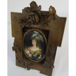 Miniature portrait painting of a lady approx 9cm x 12 cm in a carved wooden frame 18 cm x 26 cm