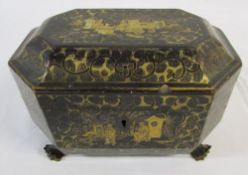 Lacquered box in the form of a tea caddy with oriental designs on claw feet
