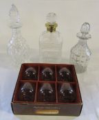 Boxed set of brandy glasses & 3 decanters
