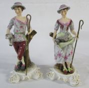 Pair of Royal Crown Derby figures of a Shepherd and Shepherdess modelled on rococo scroll bases