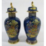 Near pair of blue Carlton ware lidded vases 'New Mikado' pattern H 38 cm