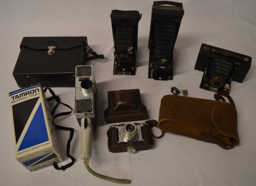 Various vintage cameras including Kodak bellows style,