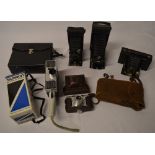 Various vintage cameras including Kodak bellows style,